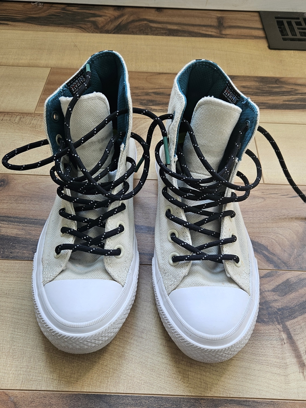 Converse Chuck Taylor High-Top Sneakers in Cream and Black